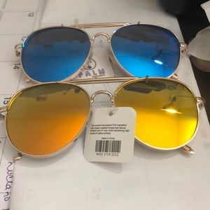 2 pair aviator sunglasses. Sold separately.